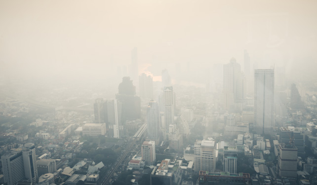 city skyline foggy from air pollution