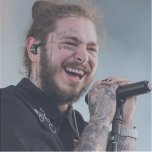 post malone grinning with microphone in hands