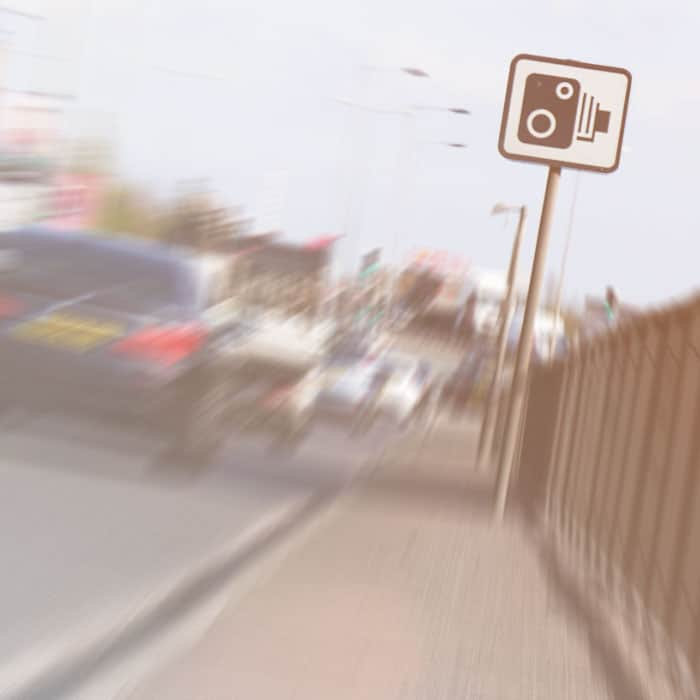 Speed camera warning sign