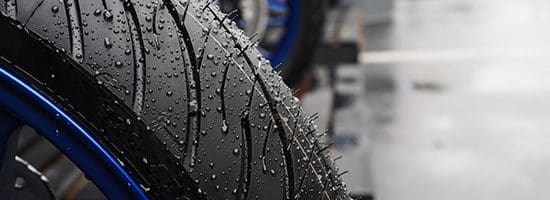 A wet motorbike wheel