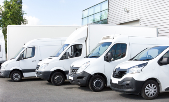 White vans parked